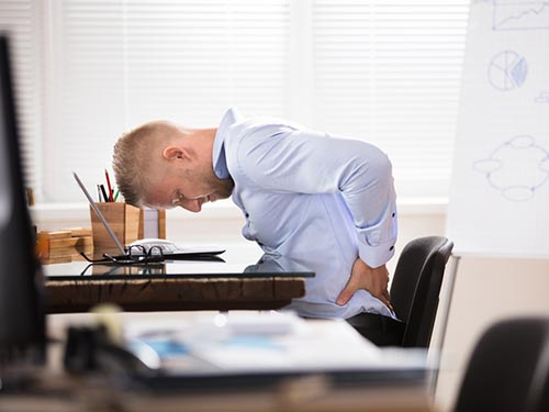 Office-worker with lower back pain