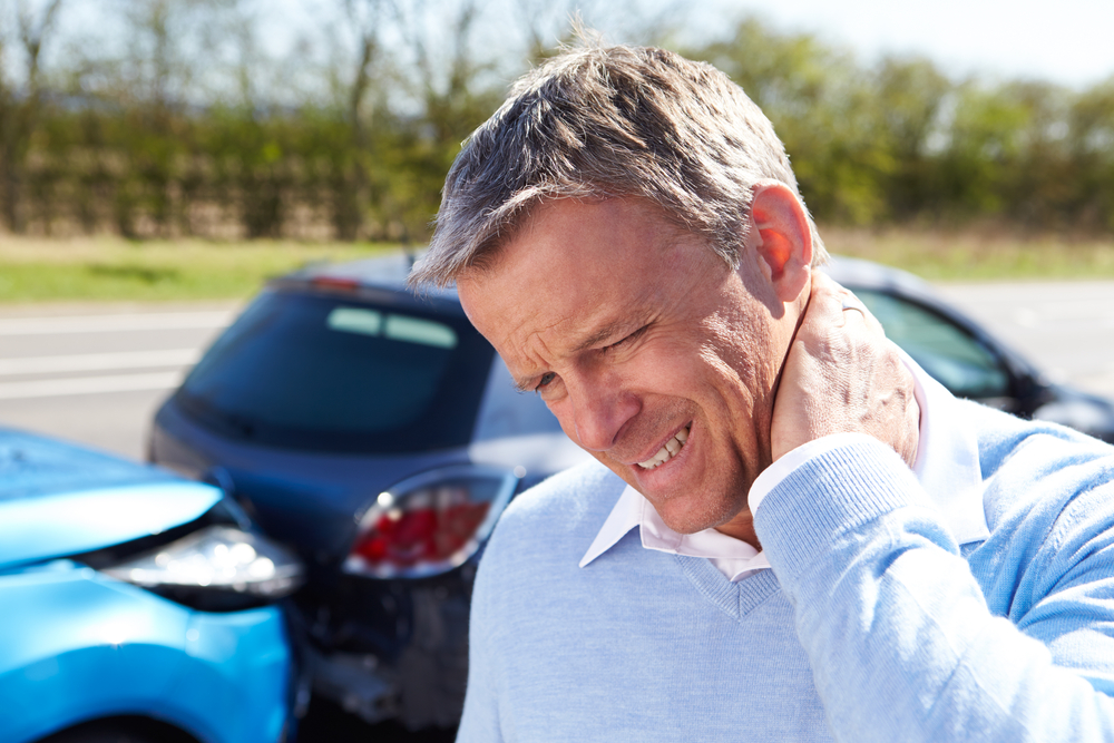 Man with whiplash pain